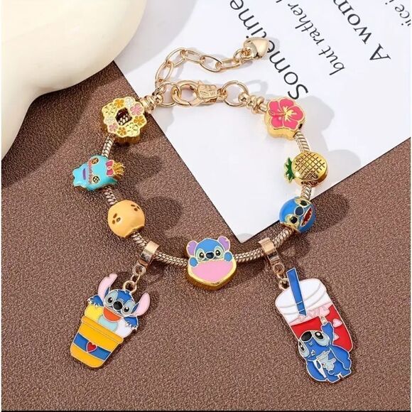 DISNEY Lilo & Stitch Gold Plated Charm Bracelet - Picture 1 of 6